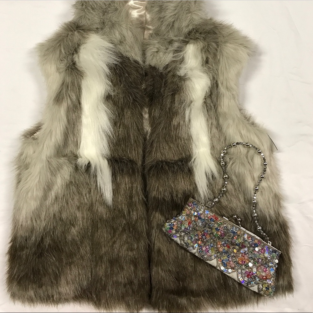 Faux fur hooded vest.
